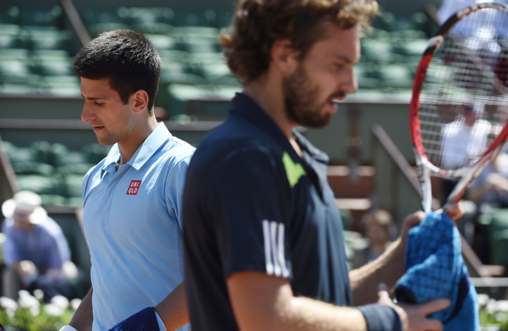 FOTO: Gulbis savā pirmajā Grand Slam pusfinālā četros setos piekāpjas Džokovičam